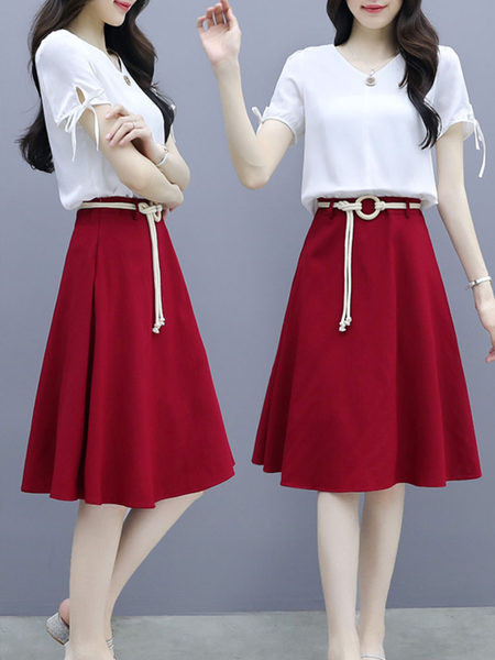 Дамски комплект  от две части пола и блуза с връзки