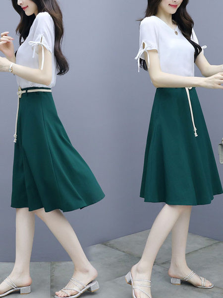 Дамски комплект  от две части пола и блуза с връзки