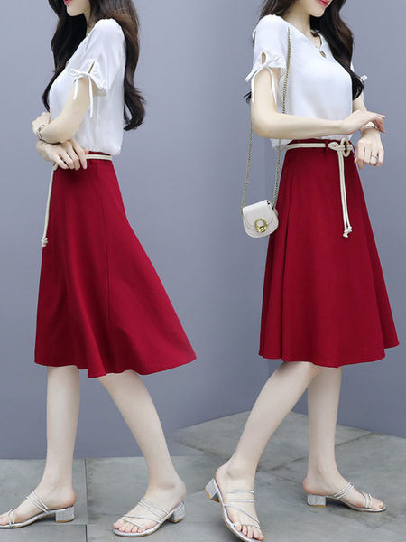 Дамски комплект  от две части пола и блуза с връзки