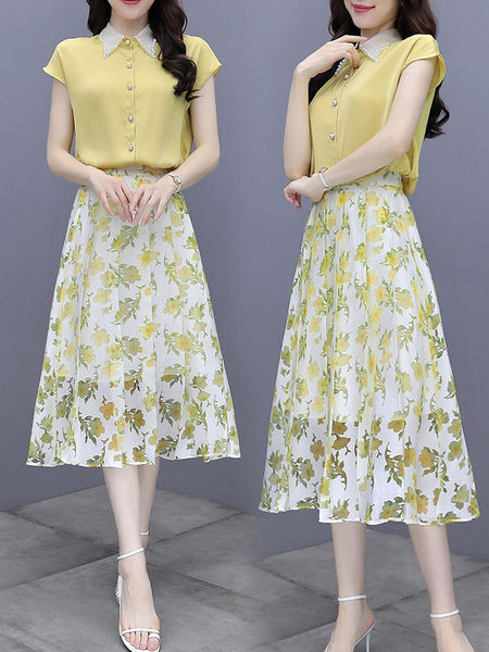 Naiste komplekt kaheosalisest klassikalise kraega värvilisest seelikust ja särgist