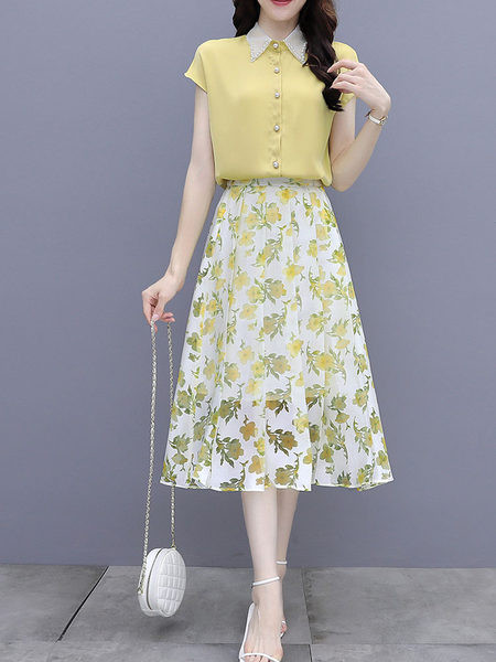 Naiste komplekt kaheosalisest klassikalise kraega värvilisest seelikust ja särgist