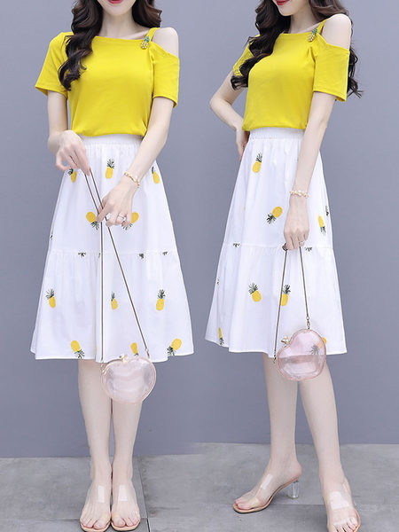 Moderan ženski komplet bluze golih ramena i suknje