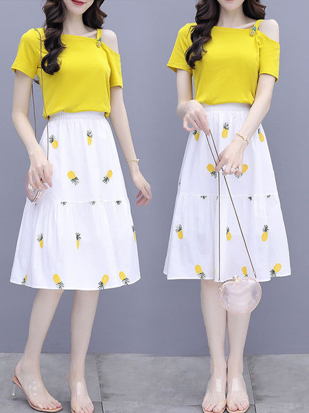 Moderan ženski komplet bluze golih ramena i suknje