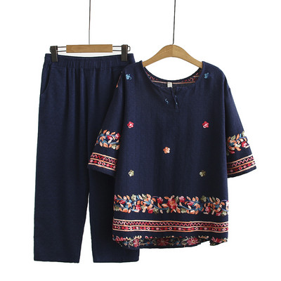 Γυναικείο σετ με φλοράλ μοτίβα παντελόνι και μπλούζα με οβάλ λαιμόκοψη