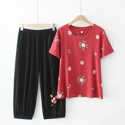 Naiste vabaaja komplekt kaheosalisest pluusist ja pükstest