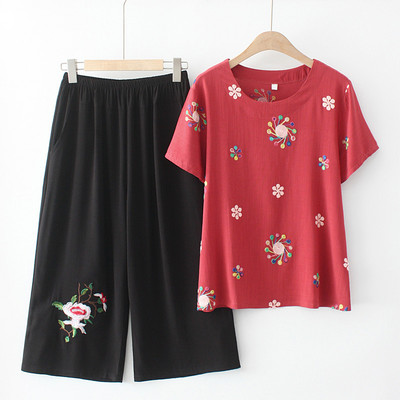 Naiste vabaaja komplekt kaheosalisest pluusist ja pükstest