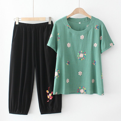 Naiste vabaaja komplekt kaheosalisest pluusist ja pükstest