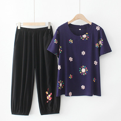 Naiste vabaaja komplekt kaheosalisest pluusist ja pükstest