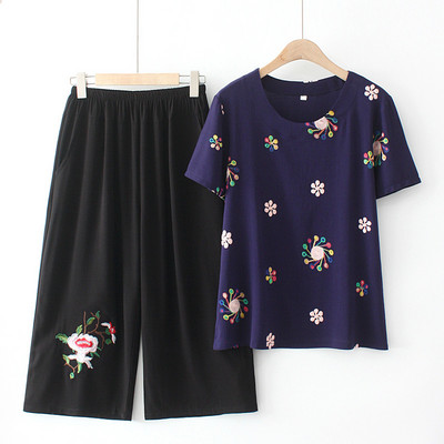 Naiste vabaaja komplekt kaheosalisest pluusist ja pükstest