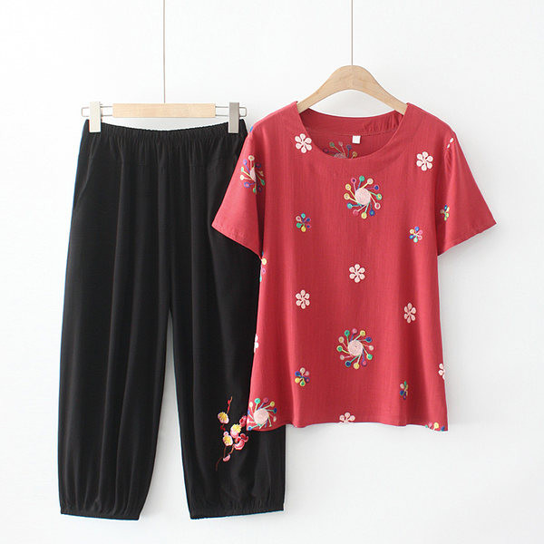 Naiste vabaaja komplekt kaheosalisest pluusist ja pükstest