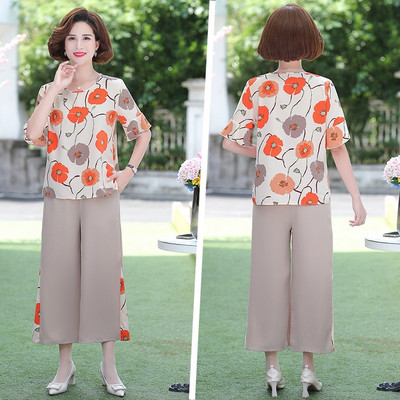 Naiste kaasaegne komplekt - pluus ja püksid