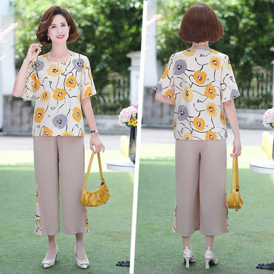 Naiste kaasaegne komplekt - pluus ja püksid