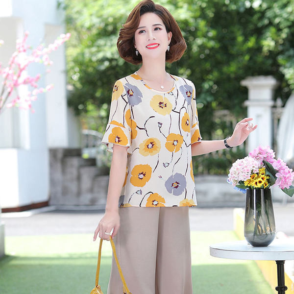 Naiste kaasaegne komplekt - pluus ja püksid