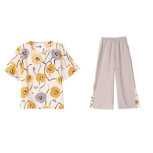 Naiste kaasaegne komplekt - pluus ja püksid