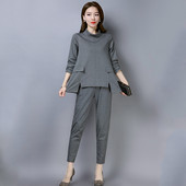 Naiste komplekt kaheosalisest pikkade varrukatega pluusi ja kõrge vöökohaga pükstega