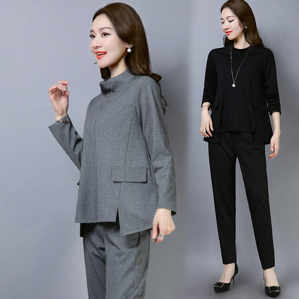 Naiste komplekt kaheosalisest pikkade varrukatega pluusi ja kõrge vöökohaga pükstega