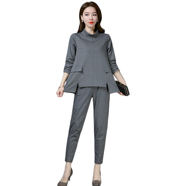 Naiste komplekt kaheosalisest pikkade varrukatega pluusi ja kõrge vöökohaga pükstega