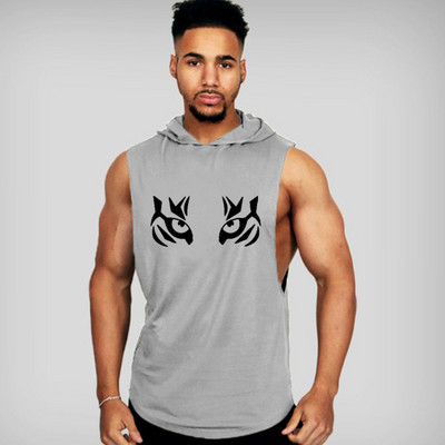 Kapuutsi ja aplikatsiooniga meeste topp