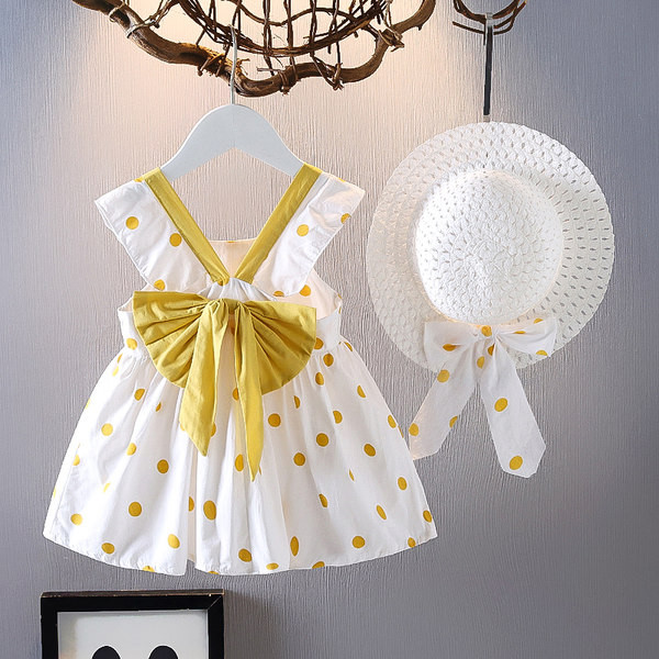 Modern gyerekruha pöttyökkel és szalaggal