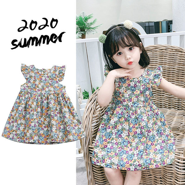 Παιδικό φόρεμα με φλοράλ μοτίβο και στρογγυλή λαιμόκοψη