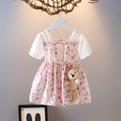 Modern gyerekruha gombokkal és virágmotívumokkal