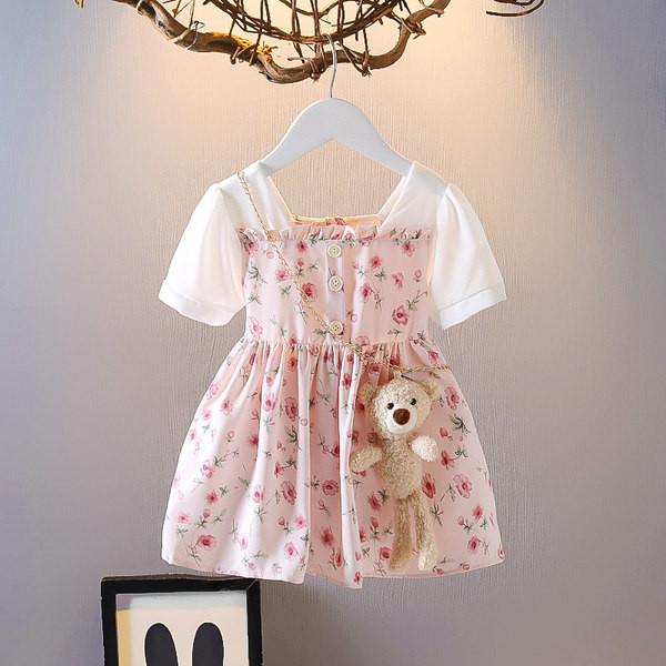 Modern gyerekruha gombokkal és virágmotívumokkal