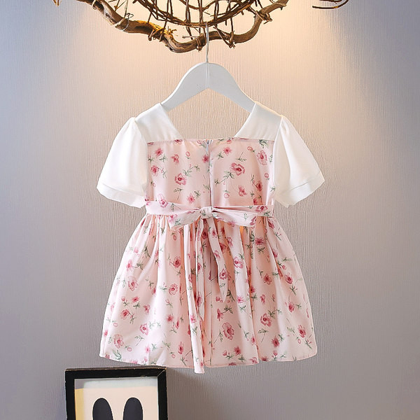 Modern gyerekruha gombokkal és virágmotívumokkal