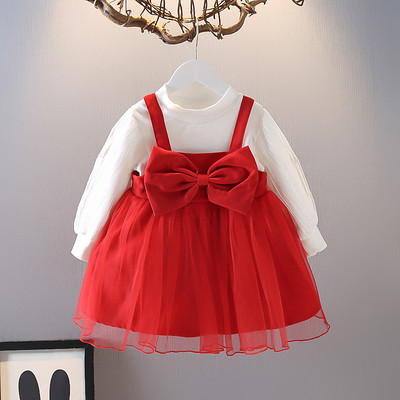 Punase ja sinise värvi paela ja tülliga lastekleit