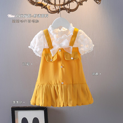 Laste kaasaegne nööpidega kleit