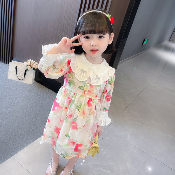 Modern gyerekruha gombokkal és fürtökkel lányoknak