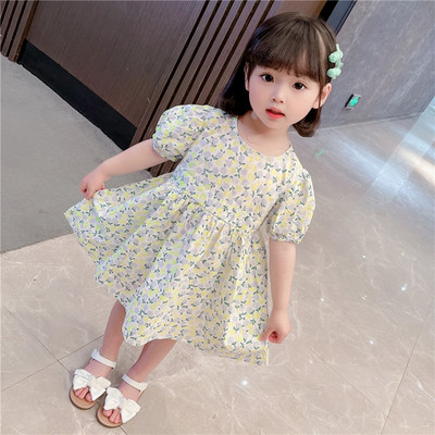 Μοντέρνο παιδικό φόρεμα με φλοράλ μοτίβα και οβάλ λαιμόκοψη