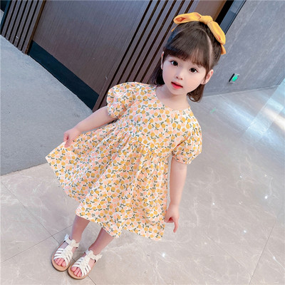 Μοντέρνο παιδικό φόρεμα με φλοράλ μοτίβα και οβάλ λαιμόκοψη