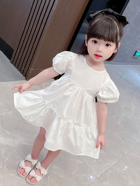 Gyerekruha gombokkal és szalaggal