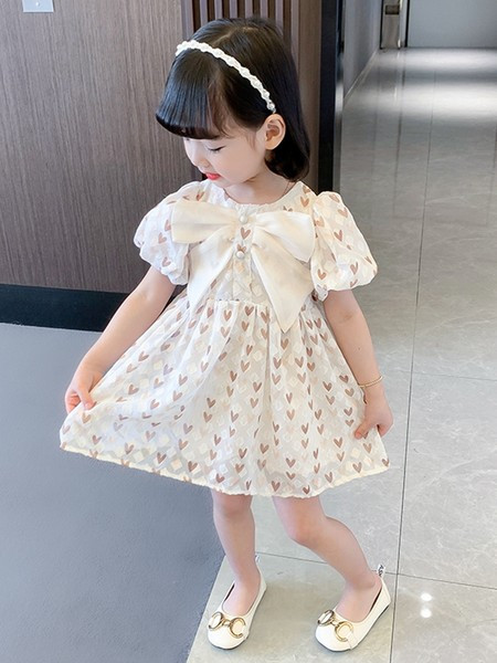 Alkalmi gyerekruha szalaggal és gombokkal