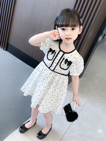 Детска лятна рокля с джобове и панделки