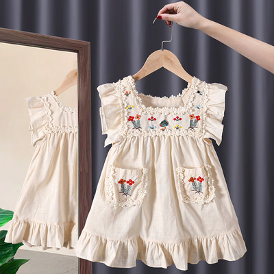 Μοντέρνο παιδικό φόρεμα με μπούκλες και κέντημα