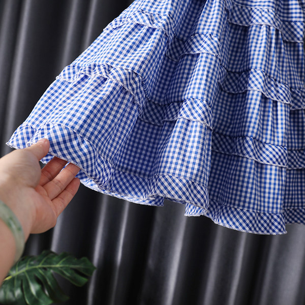 Карирана детска рокля в син цвят подходяща за лятото 