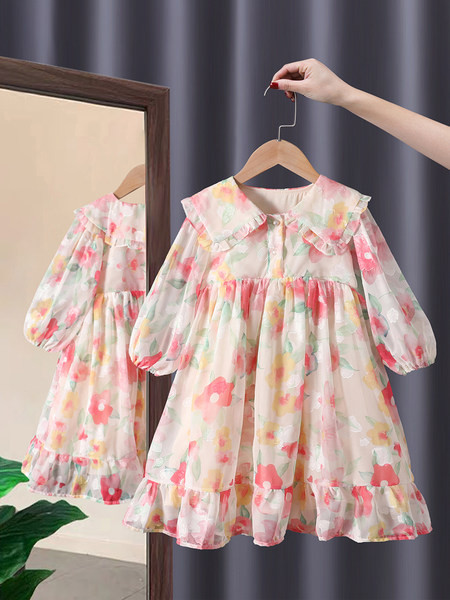 Dječja haljina sa cvjetnim motivima i gumbima