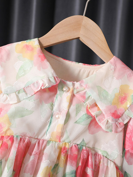 Dječja haljina sa cvjetnim motivima i gumbima