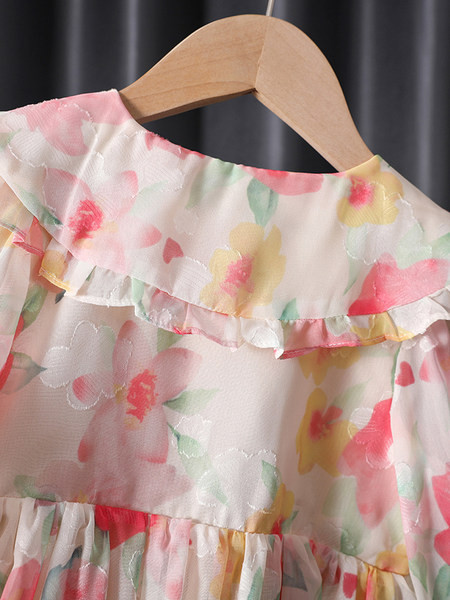 Dječja haljina sa cvjetnim motivima i gumbima