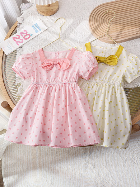 Модерна детска рокля на точки с панделка