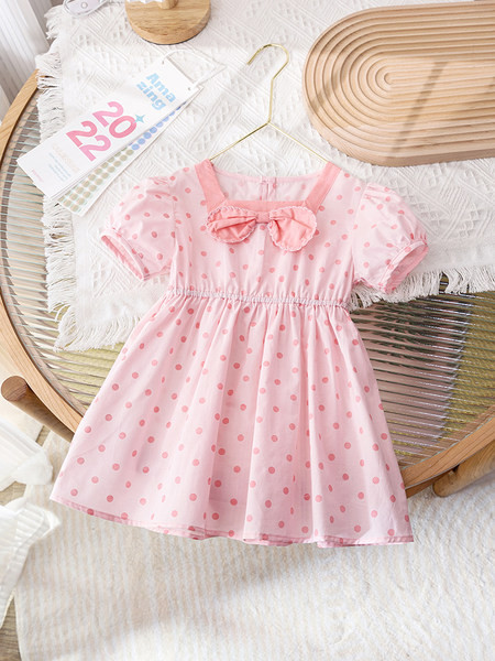 Модерна детска рокля на точки с панделка
