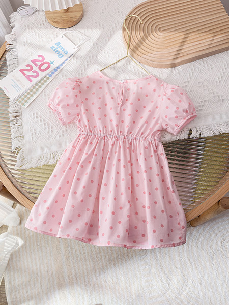 Модерна детска рокля на точки с панделка