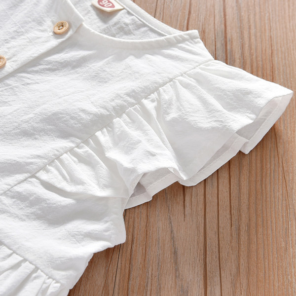 Dječja haljina s ovalnim izrezom i gumbima