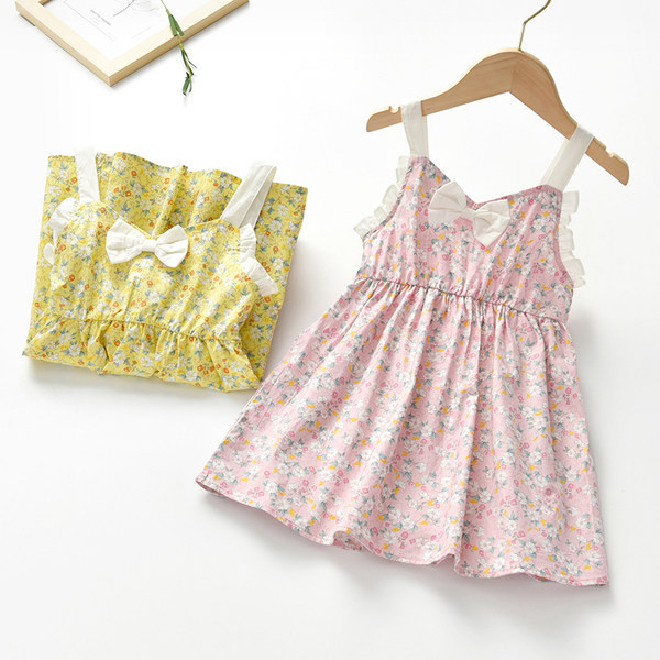 Dječja haljina sa cvjetnim motivima i trakom