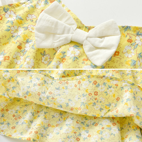 Dječja haljina sa cvjetnim motivima i trakom