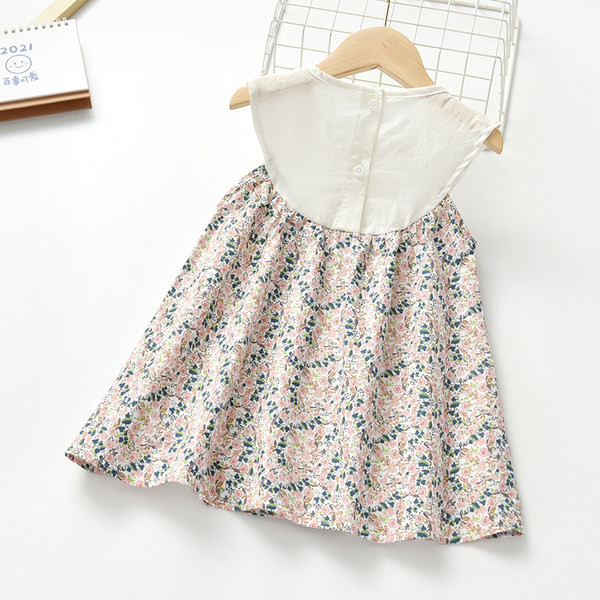 Детска флорална рокля с бродерия и овално деколте 