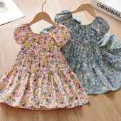 Dječja haljina s kratkim rukavima i cvjetnim motivima