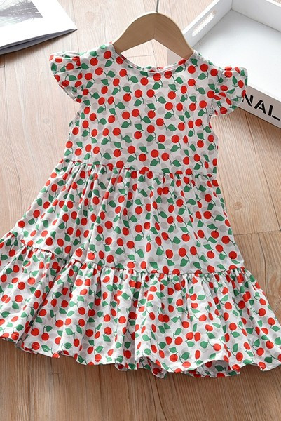 Värviline ovaalse kaelusega lastekleit – lõikega mudel