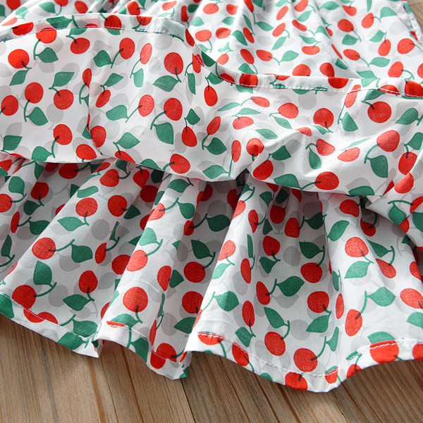 Värviline ovaalse kaelusega lastekleit – lõikega mudel